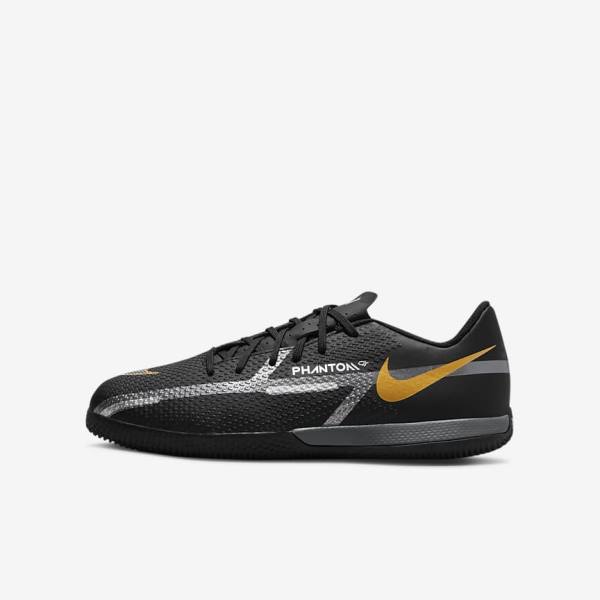 Black / Metal Gold / Dark Grey / Metal Dark Grey Kids\' Nike Jr. Phantom GT2 Academy IC Older Indoor Court Football Shoes | NK971YWM