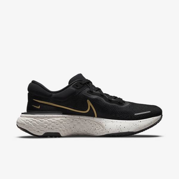 Black / Metal Gold Men's Nike ZoomX Invincible Run Flyknit Road Running Shoes | NK523LWO