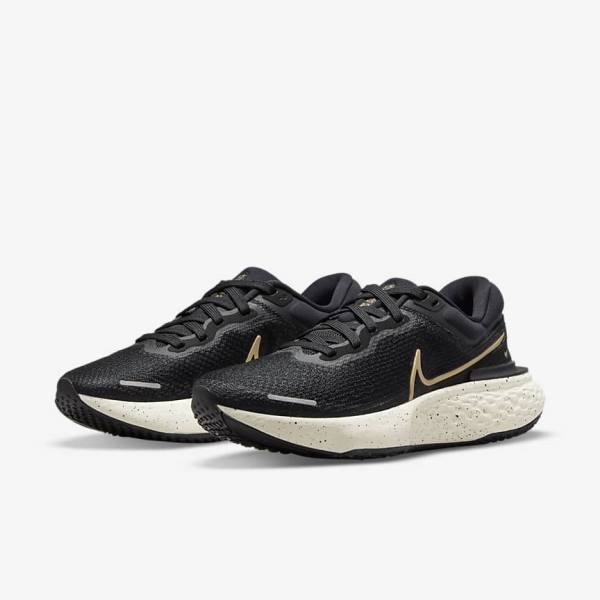 Black / Metal Gold Women's Nike ZoomX Invincible Run Flyknit Road Running Shoes | NK751DNQ