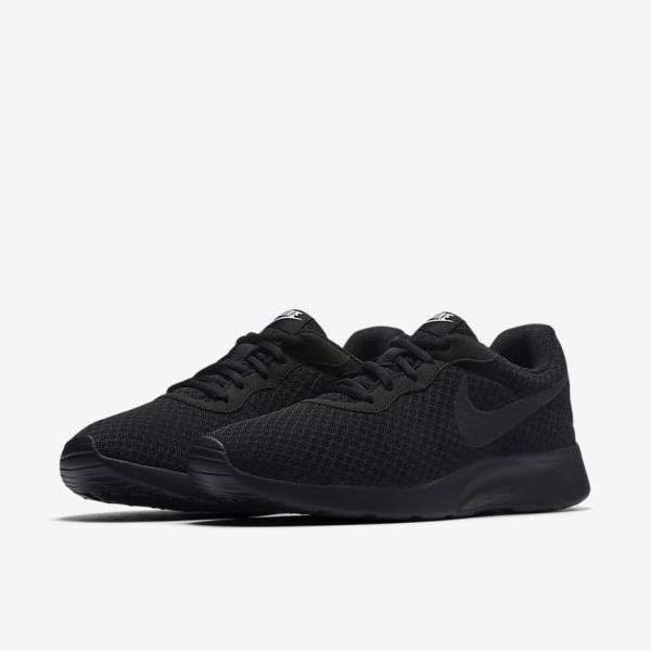 Black / White Women's Nike Tanjun Sneakers | NK183MQL