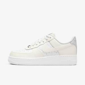 White / Platinum Women's Nike Air Force 1 07 Sneakers | NK768YAL